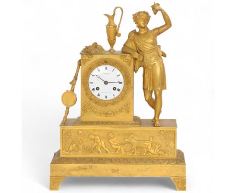 A 19th century French gilt-bronze Classical figural mantel clock, by Comminges, Palais-Royal, white enamel dial with black Ro
