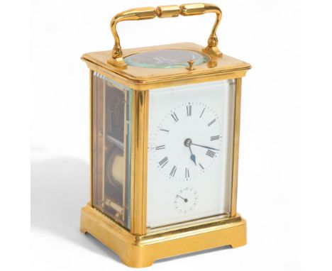 A 19th century French brass repeater alarm carriage clock, white enamel dial with Roman numeral hour markers, blued steel spa