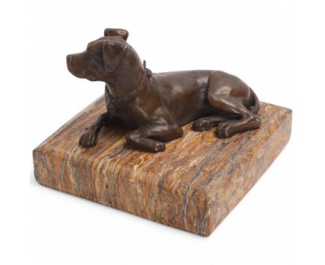 A French patinated bronze hunting dog sculpture, modelled as a recumbent dog, unsigned, on polished strata marble plinth, hei