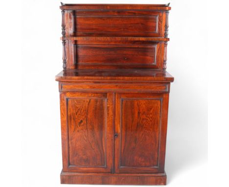 A 19th century rosewood chiffonier, with panel backed shelves above, width 88cm, depth 42cm