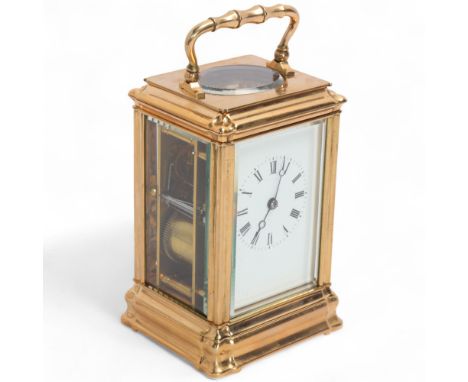 A 19th century French brass carriage clock, white enamel dial with Roman numeral hour markers, blued steel Breguet hands, sha