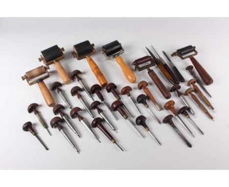 A collection of mid to late 20th century engraving tools, optics, print rollers and other tools used by the late Alan Dow in 