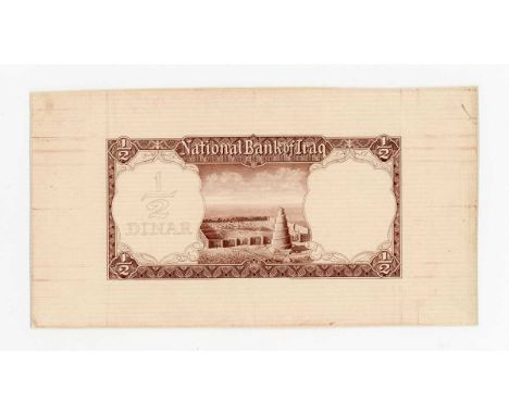 An extremely rare and striking National Bank of Iraq partial banknote die proof engraver's test strike for the reverse of a h