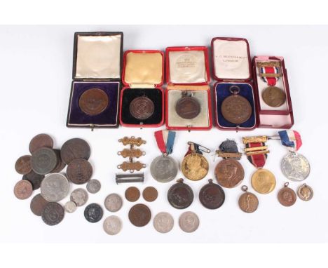 A large collection of various British and world coins, medallions and other paranumismatic items, including an Edward VII pen