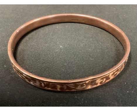 A 9ct gold rose gold bangle, 11.4g 