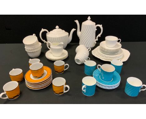 An Aynsley, spirally fluted pattern part tea service; five Aynsley, blue, spirally fluted coffee cans and saucers; silva davi