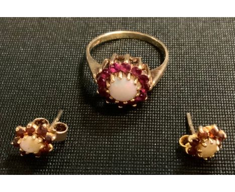 A Ruby and opal floral cluster ring, 9ct gold mount;  pair of conforming earrings, 3.3g gross 