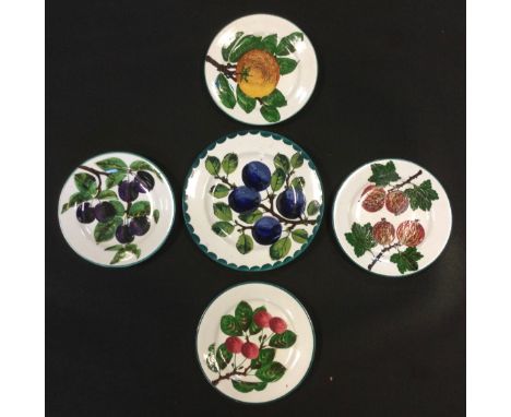 An R H &amp; S Wemyss circular plate, painted with ripening Plums, T Goode &amp; Co printed marks, impressed Wemyss marks, 17