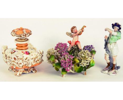 A CONTINENTAL PORCELAIN FIGURE OF A MAN, AN ENGLISH PORCELAIN SCENT BOTTLE AND STOPPER DECORATED WITH FLOWERS ON AN APRICOT G