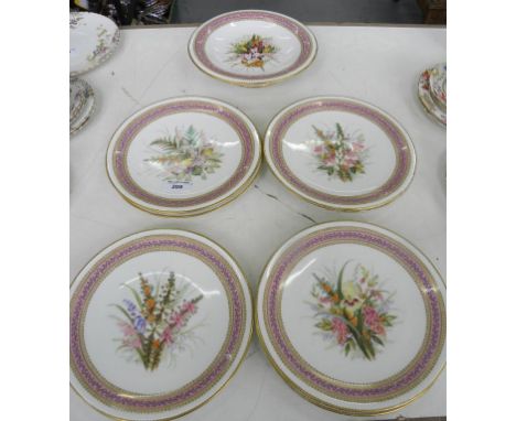 AN EARLY ROYAL WORCESTER SEVEN PIECE JEWELLED DESSERT SERVICE, PAINTED WITH WILD FLOWERS AND HEATHERS IN PINK BORDER, IMPRESS