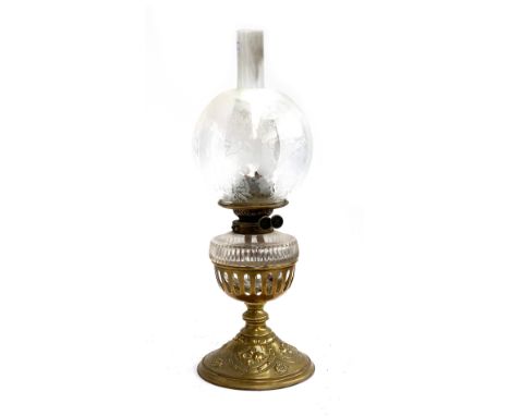 A late Victorian Hinks &amp; Sons brass Duplex oil Lamp, floral design to base, the glass shade etched with cherubs, birds an