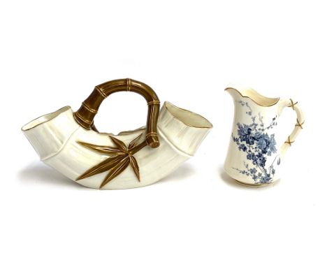 A Royal Worcester porcelain bamboo basket, 26cmL; together with a small Royal Worcester jug (2) 