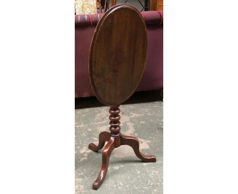 An oval tip-top occasional table on bobbin turned column and tripod base, 52x40x67cmH 