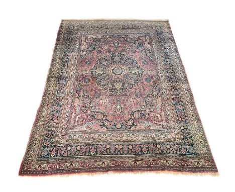 A large West Persian carpet, retailed by Liberty, 278x375cm 