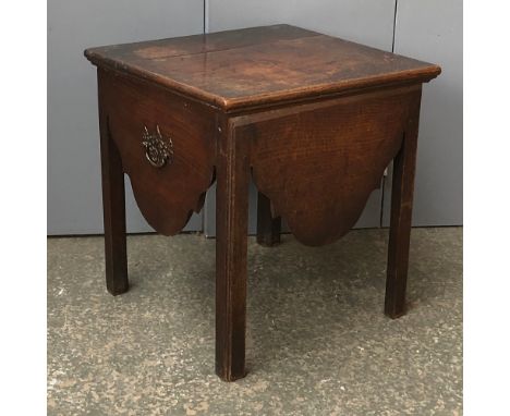 A George III oak commode stool, having twin handles carry, 49x56x51cmH 