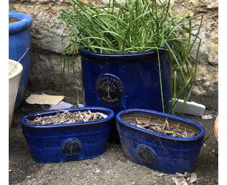 A blue glazed 'Heritage Garden Pottery' planter, 34cmH 38cmD; together with a pair of 'Heritage Garden Pottery' oval planters
