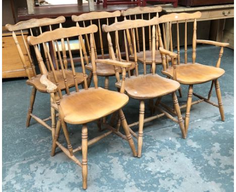 A set of six stick back beech and ply kitchen chairs 