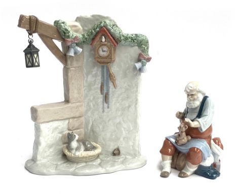 A boxed Lladro 'It's Almost Time' (Santa's Workshop) figurine, model no. 6895, 28cmH; together with 'Santa's Magic Touch', mo