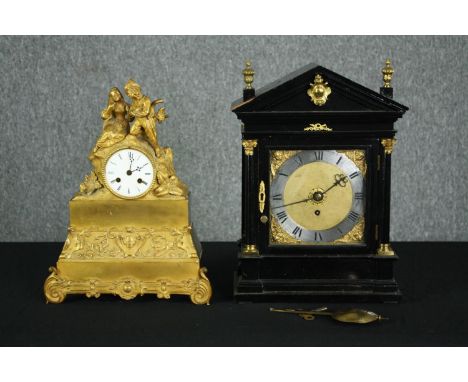 A 19th century French gilt metal mantel clock and a late 19th century ebonised and ormolu mounted bracket clock. H.41 W.30 D.