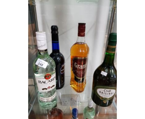4 ASSORTED BOTTLES OF ALCOHOL INC GRANTS SCOTCH WHISKY AND BACARDI ETC