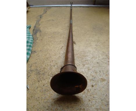 A chromed brass and copper hunting horn