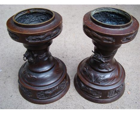 A pair of Japanese vases converted into lamp bases, decorated with dragons, 22cm high. 