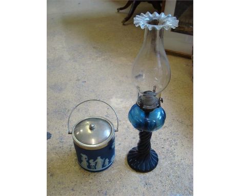 A wEdgwood Jasperware biscuit barrel and lid together with an oil lamp. 