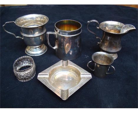 A small silver tankard, London, 1970 by R Hodd & Son; a silver cup, Birmingham, 1935 by A L Davenport Ltd; a silver jug, Birm