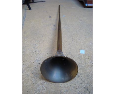 A brass hunting / coach horn, 125cm long. 