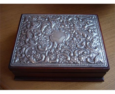 A mahogany jewellery box with a floral silver plaque, Sheffield, 1993 by R. Carr. 