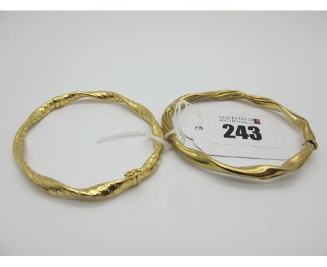 A Modern Hinged Bangle, of twisted design (sprung hinge), stamped "9ct"; Together with Another Hinged Bangle, stamped "375" (