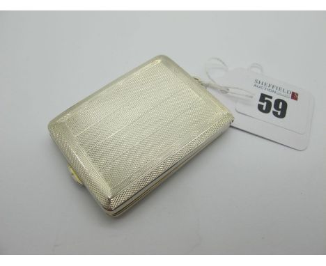 A Hallmarked Silver Match Book Case, Chester 1925, allover engine turned and gilt lined, with suspension loop. 
