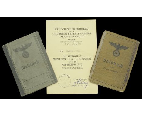 A German Second World War Army Wehrpass and Soldbuch to a Member of the Channel Islands’ Occupying Force.â€¨A 2nd pattern Weh