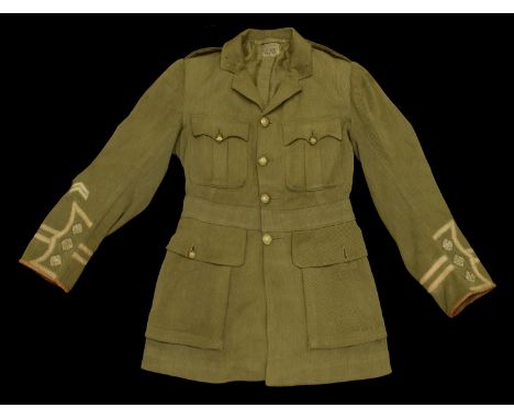 A Great War Army Service Corps Cuff Rank Tunic. A very good four pocket example, ranked to a Captain, missing its collar insi