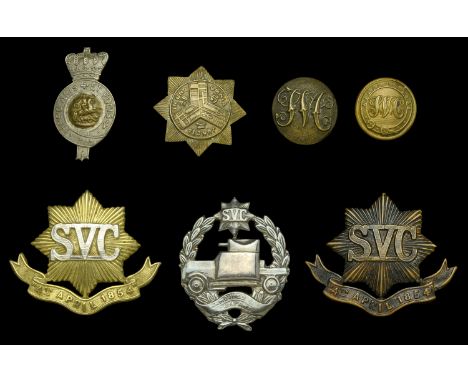 Shanghai Volunteer Corps Cap Badges and Buttons Two die stamped examples, ‘SVC on Star, with ‘4th April 1854’ banner below, t