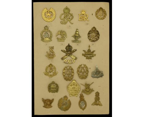 Cap Badges. A good selection of British Military Cap Badges, including Drake Battalion Royal Naval Division, Hood Battalion R