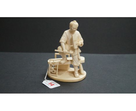 A Japanese carved ivory okimono of a carpenter, Meiji period, carved signature to base, 14cm high. Condition Report: Minor sp