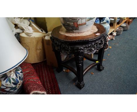 A Chinese carved hardwood and marble top jardiniere stand, late 19th century, of octafoil outline, 45.5cm high x 45.5cm diame