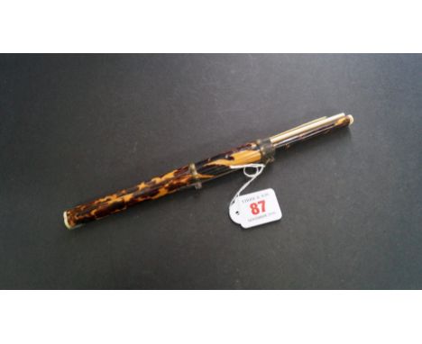 An Oriental tortoiseshell and bone chopstick set, late 19th century.