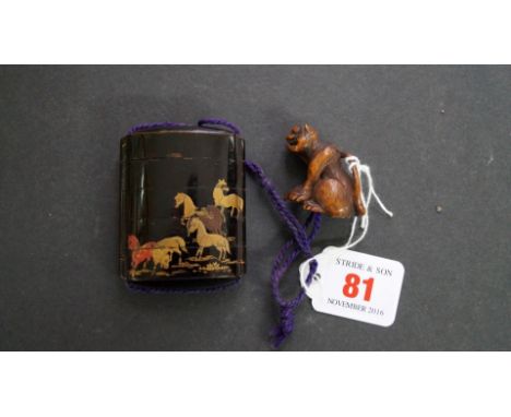 A Japanese lacquer four case inro and cover, Meiji period, decorated with horses, 6.6cm high, with carved wood netsuke of a l