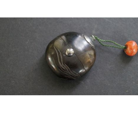A Japanese carved wood single case inro and cover, Meiji period, carved in shallow relief with two rats, with silver mounts, 