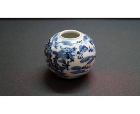 A Chinese blue white small ovoid vase, Xuande four character mark, painted with a pair of four-clawed dragons and a flaming p