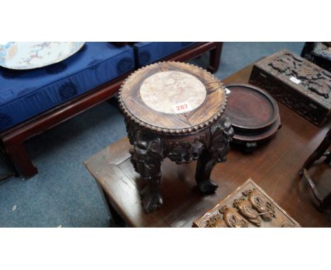 A Chinese carved hardwood and marble top jardiniere stand, 28cm high x 21cm diameter.