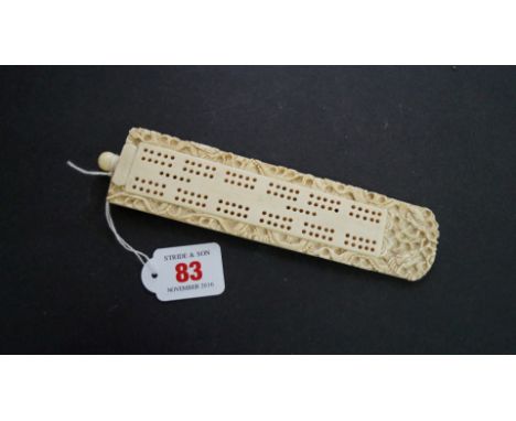 A Chinese carved ivory cribbage board, late 19th century, 19cm high.