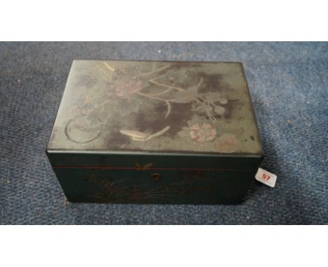 A Chinese export green lacquer tea caddy, late 18th/early 19th century, the hinged cover revealing a removable metal lined in