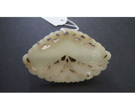A Chinese carved pale celadon jadeite and metal mounted letter clip, probably 19th century, 10.5cm wide; together with a jade