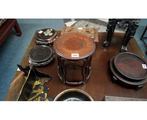 A Chinese hardwood high stand, 23cm high, aperture 18cm diameter. Condition Report: One stretcher replaced.