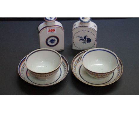 Two similar Chinese tea canisters and covers, late 18th century; together with two similar large famille rose tea bowls and s