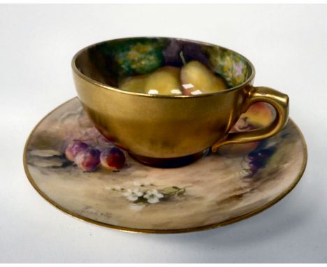 A Royal Worcester china cabinet cup and saucer with soft fruit and gilding&nbsp; bears the signature Ricketts 