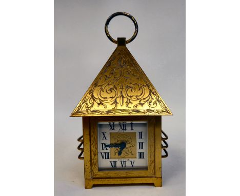 A French Garley Inc Just gilt metal cased mantel clock, in the form of a four pitched roof, over a square caged structure; th